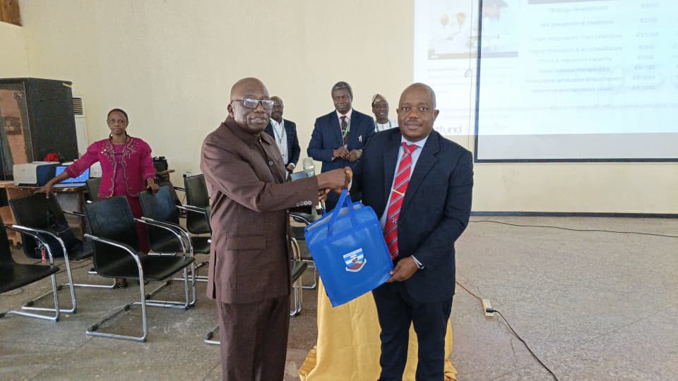 DVC Academic Professor Joshua Pam Chollom Representing the VC being presented a gift at the Training,.jpg