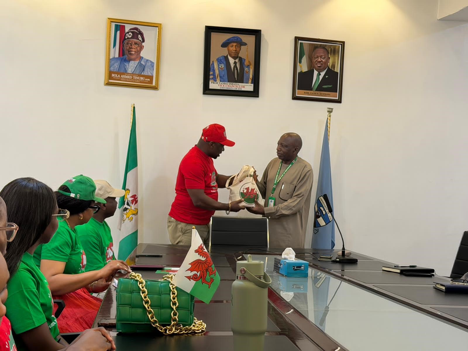 Members of the WANI Exchange delegation from Wales present a commemorative gift to the University of Jos.jpg