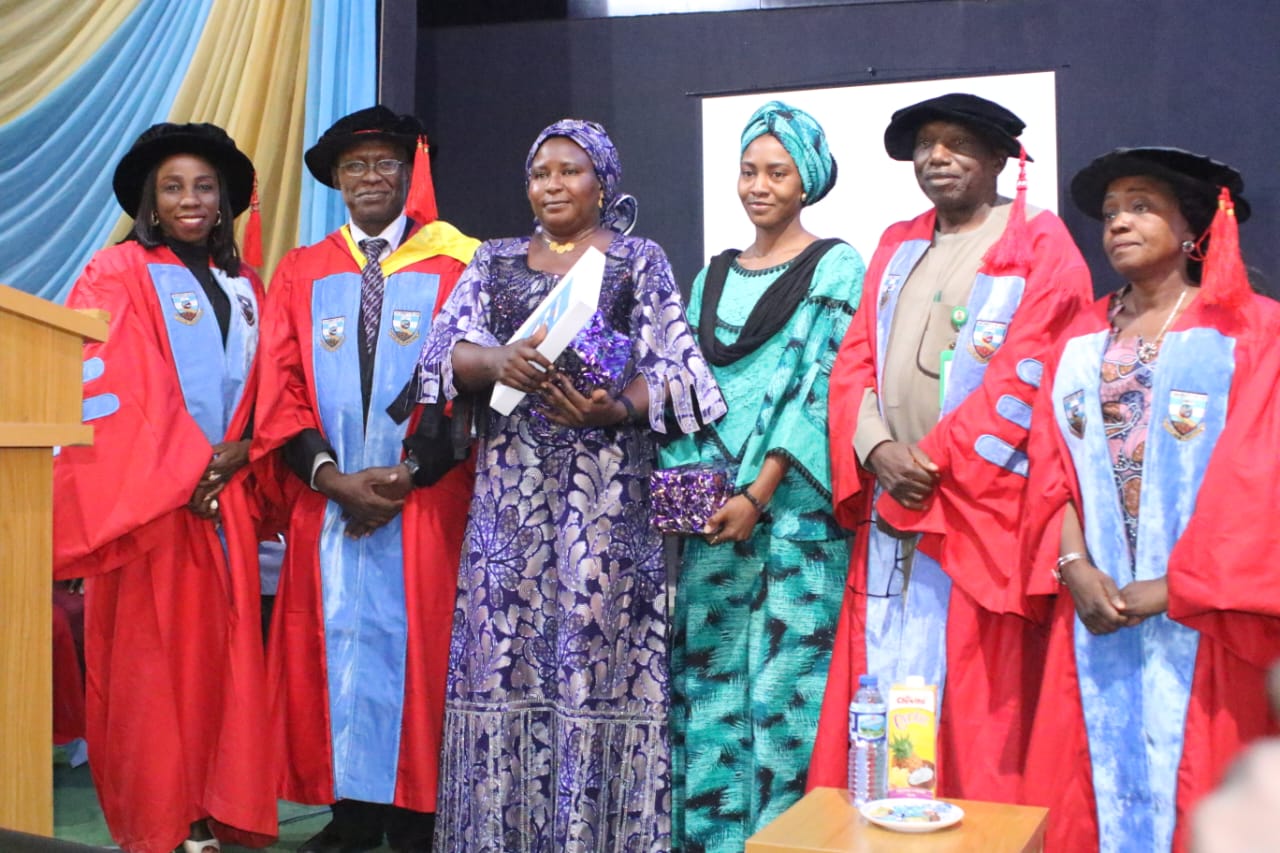 University Management with Professor Asura and family.jpg