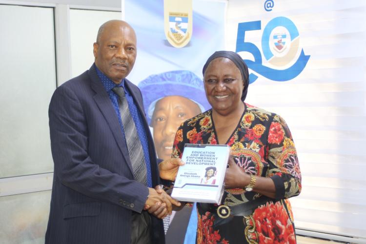 Prof. Elizabeth Abama presenting the Festchrift to the Vice-Chancellor