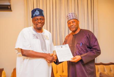 The APC National Chairman, Prof. Nentawe Yilwatda (left) receiving the letter of invitation from the Vice Chancellor, Prof. Tanko Ishaya during the visit.