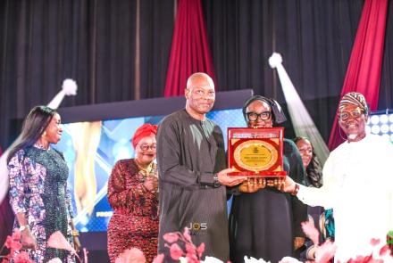 VC receiving the Award to the admiration of his dear wife, the Registrar, and Bursar..jpg