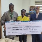 Janet flanked by the Dean Vet Medicine,Professor Bamaiyi and the DVC Admin Professor Pic Onwochei.jpg