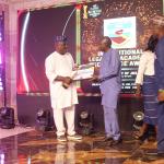 Professor J. P Chollom (DVC Academic) receiving the Award