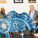 The Vice Chancellor presenting a souvenir to Ambassador Gautier.