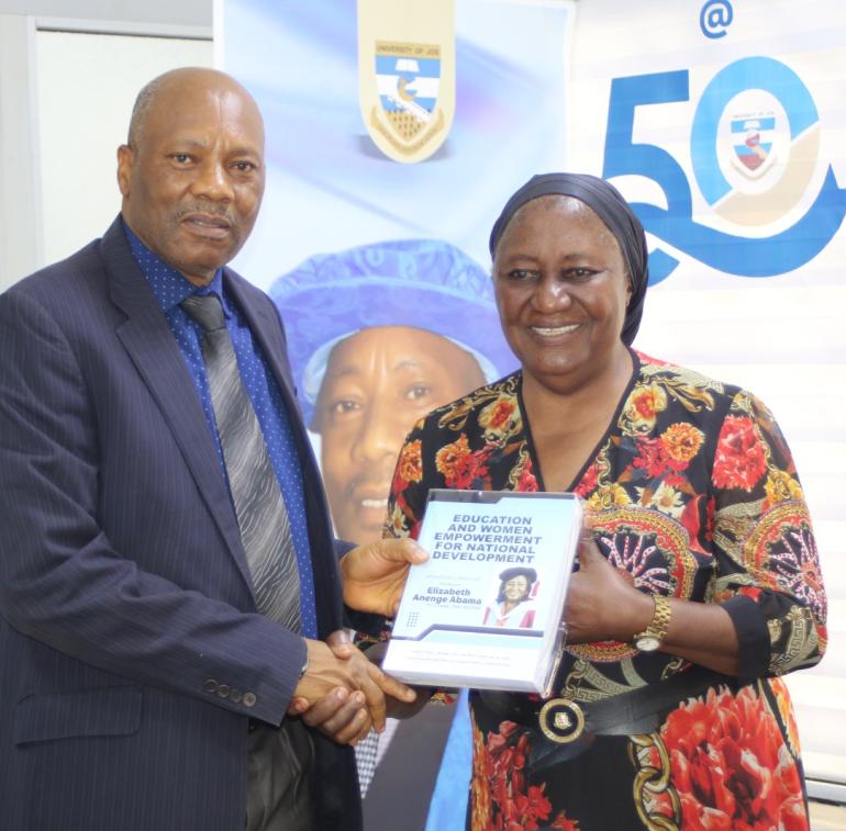 Prof. Elizabeth Abama presenting the Festchrift to the Vice-Chancellor
